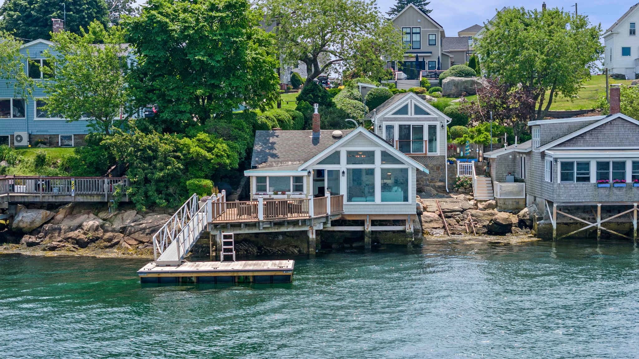 Waterfront contemporary with private dock at Rocky Neck in Gloucester, Massachusetts
